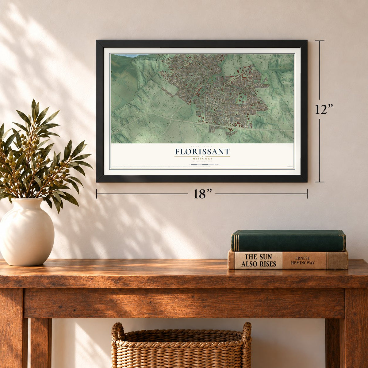 Florissant, Missouri map, 12 x 18 inch print in a black frame in an entryway