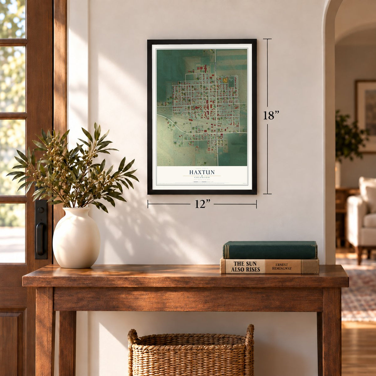 Haxtun, Colorado map, 12 x 18 inch print in a black frame in an entryway