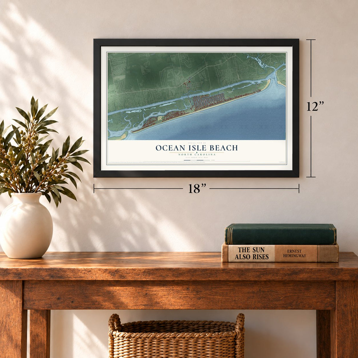 Ocean Isle Beach, North Carolina map, 12 x 18 inch print in a black frame in an entryway