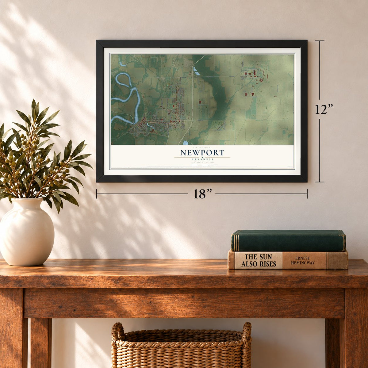 Newport, Arkansas map, 12 x 18 inch print in a black frame in an entryway