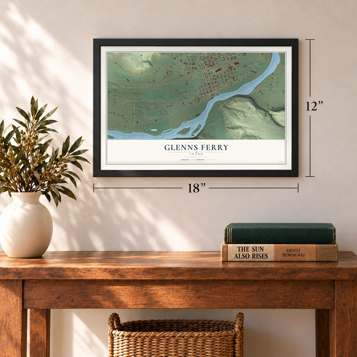 Glenns Ferry, Idaho map, 12 x 18 inch print in a black frame in an entryway