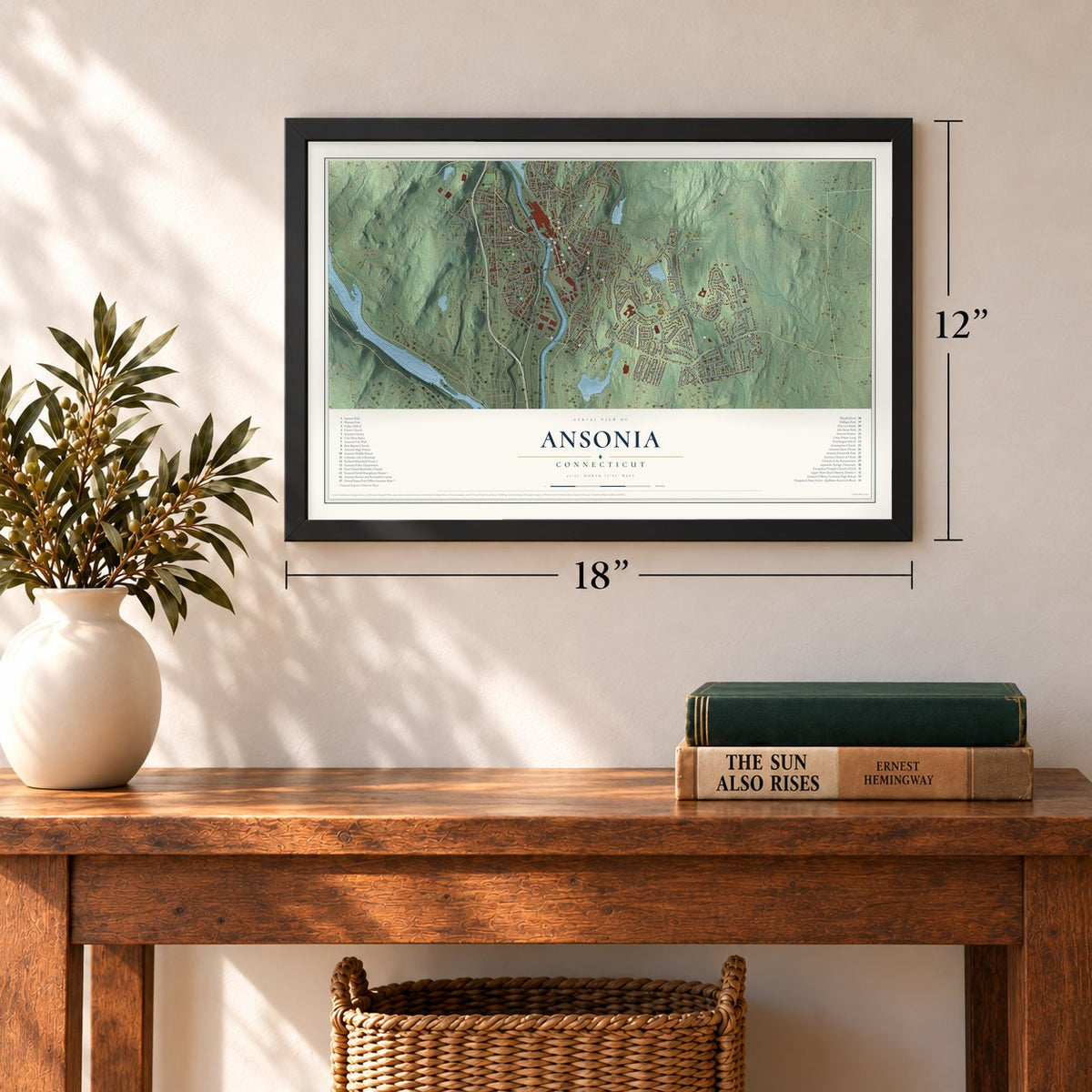 Ansonia, Connecticut map, 12 x 18 inch print in a black frame in an entryway