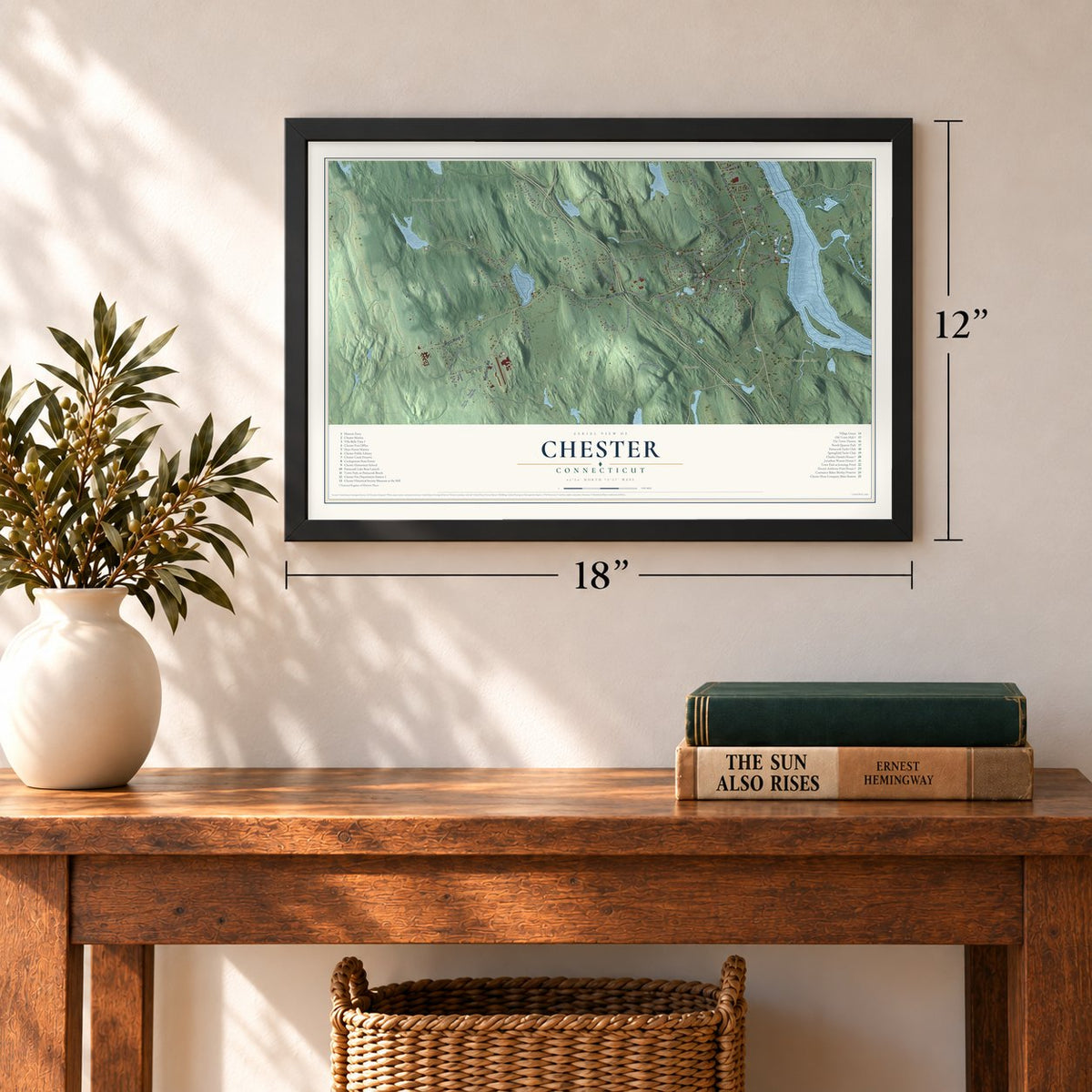 Chester, Connecticut map, 12 x 18 inch print in a black frame in an entryway