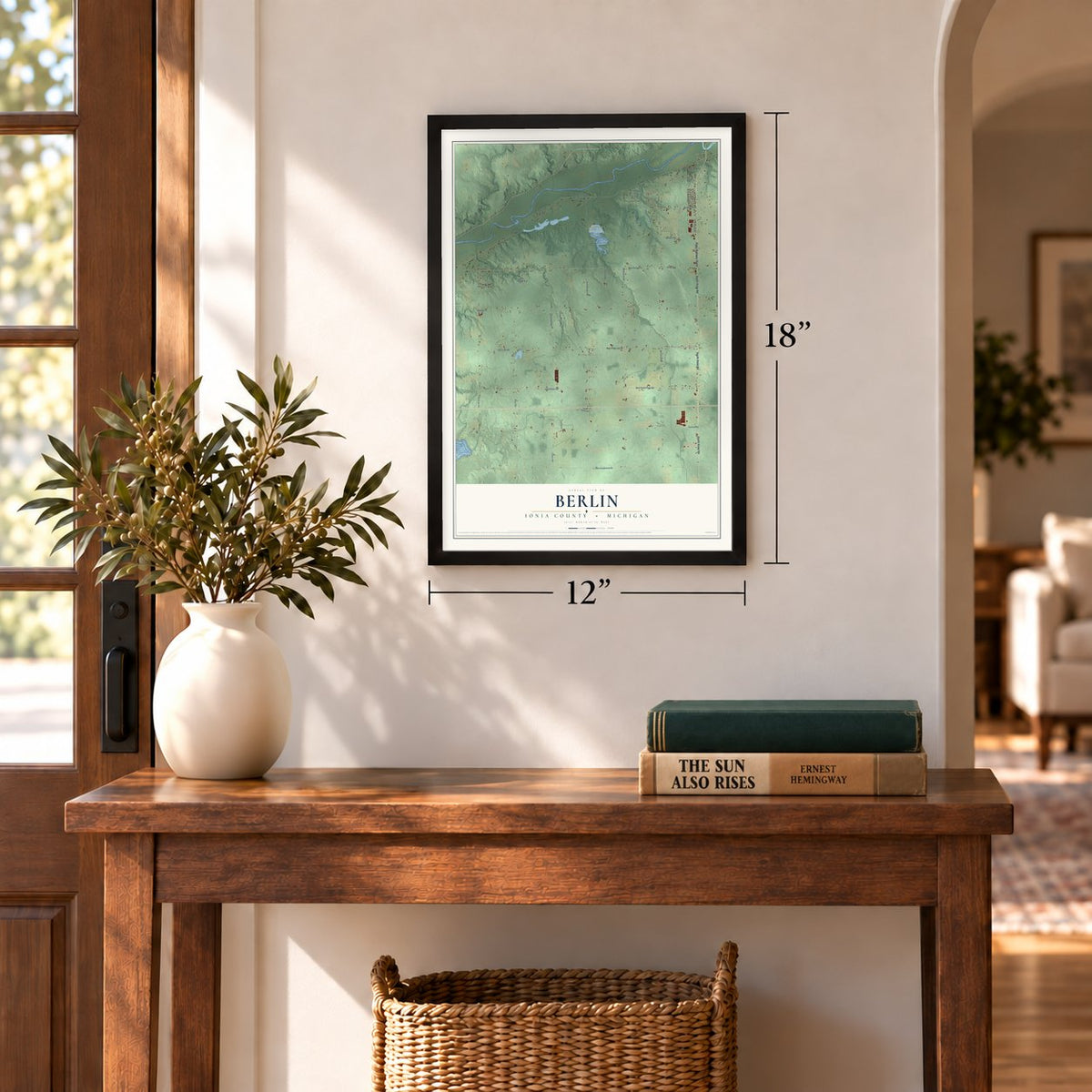 Berlin, Ionia County, Michigan map, 12 x 18 inch print in a black frame in an entryway