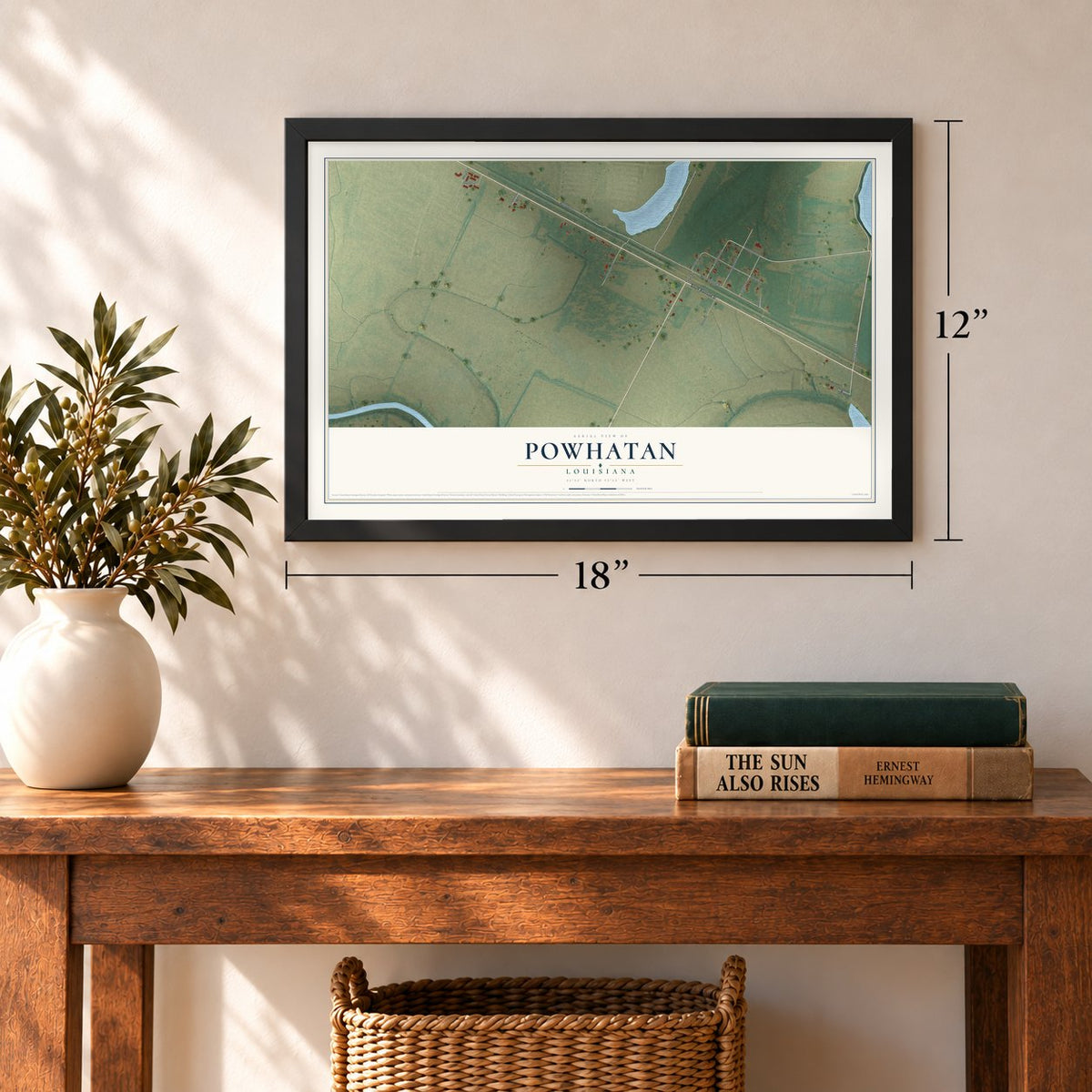 Powhatan, Louisiana map, 12 x 18 inch print in a black frame in an entryway