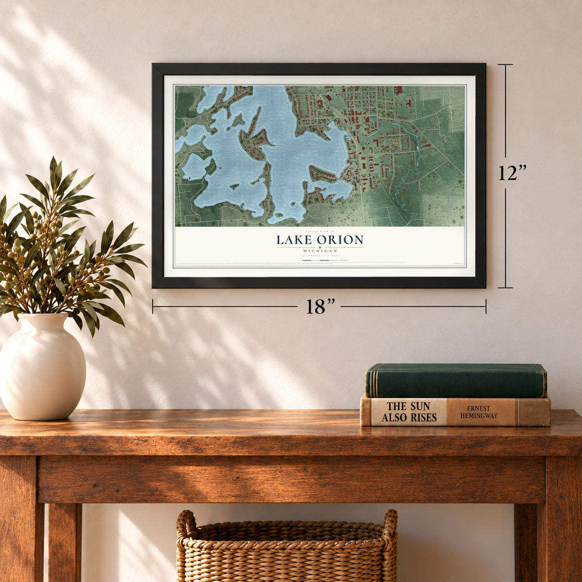 Lake Orion, Michigan map, 12 x 18 inch print in a black frame in an entryway