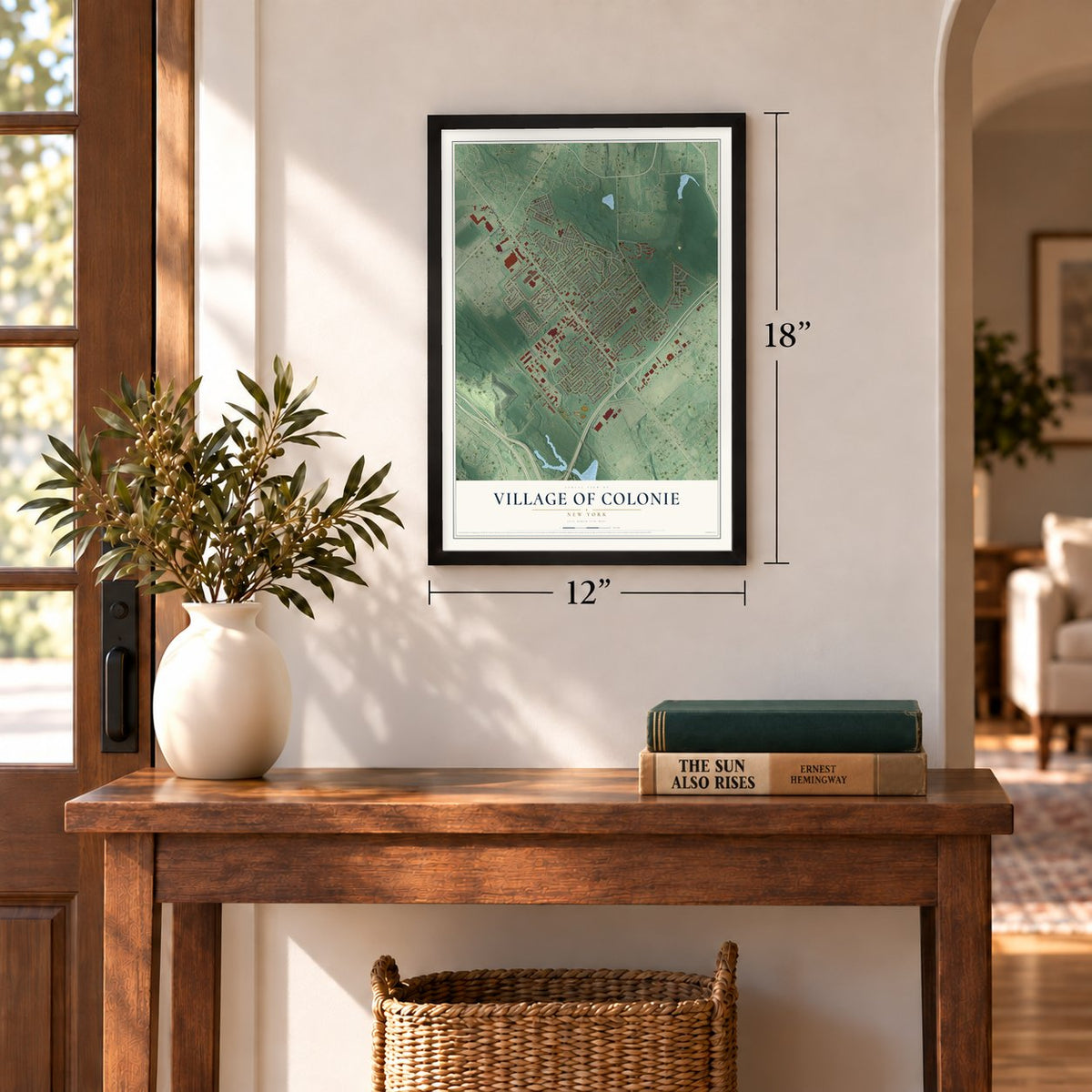 Village of Colonie, New York map, 12 x 18 inch print in a black frame in an entryway
