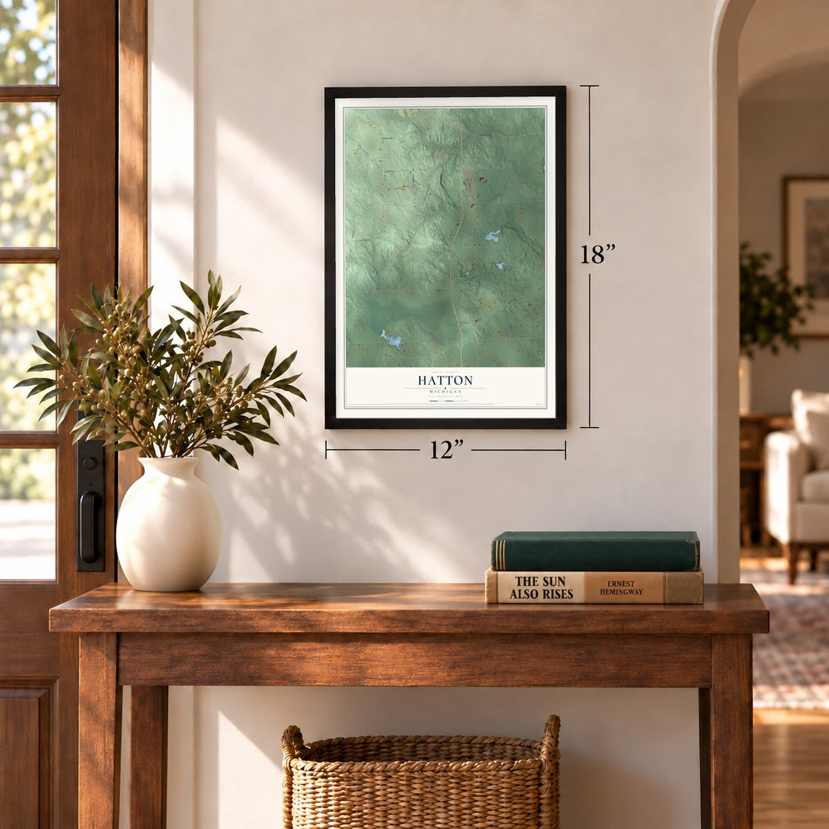 Hatton, Michigan map, 12 x 18 inch print in a black frame in an entryway