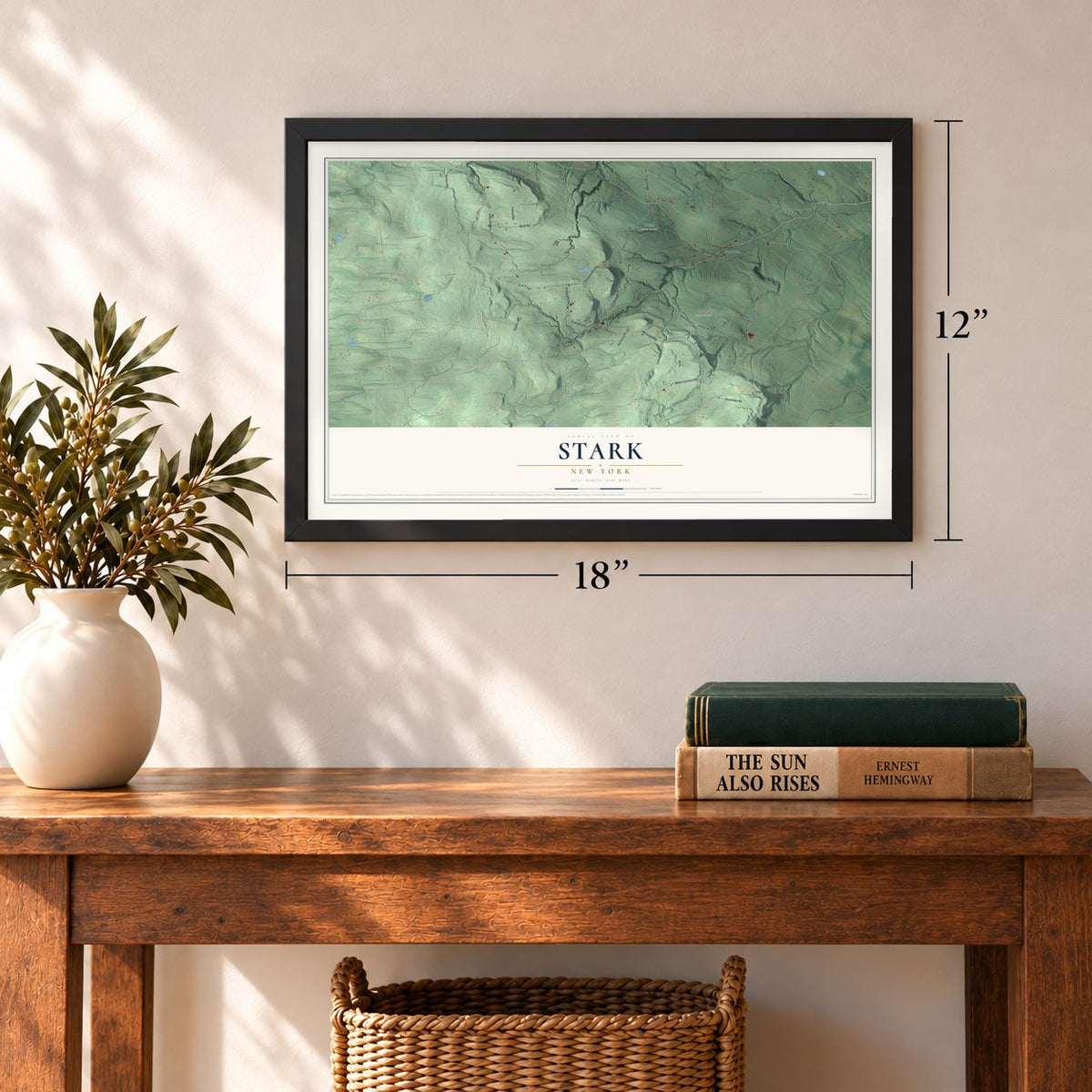 Stark, New York map, 12 x 18 inch print in a black frame in an entryway