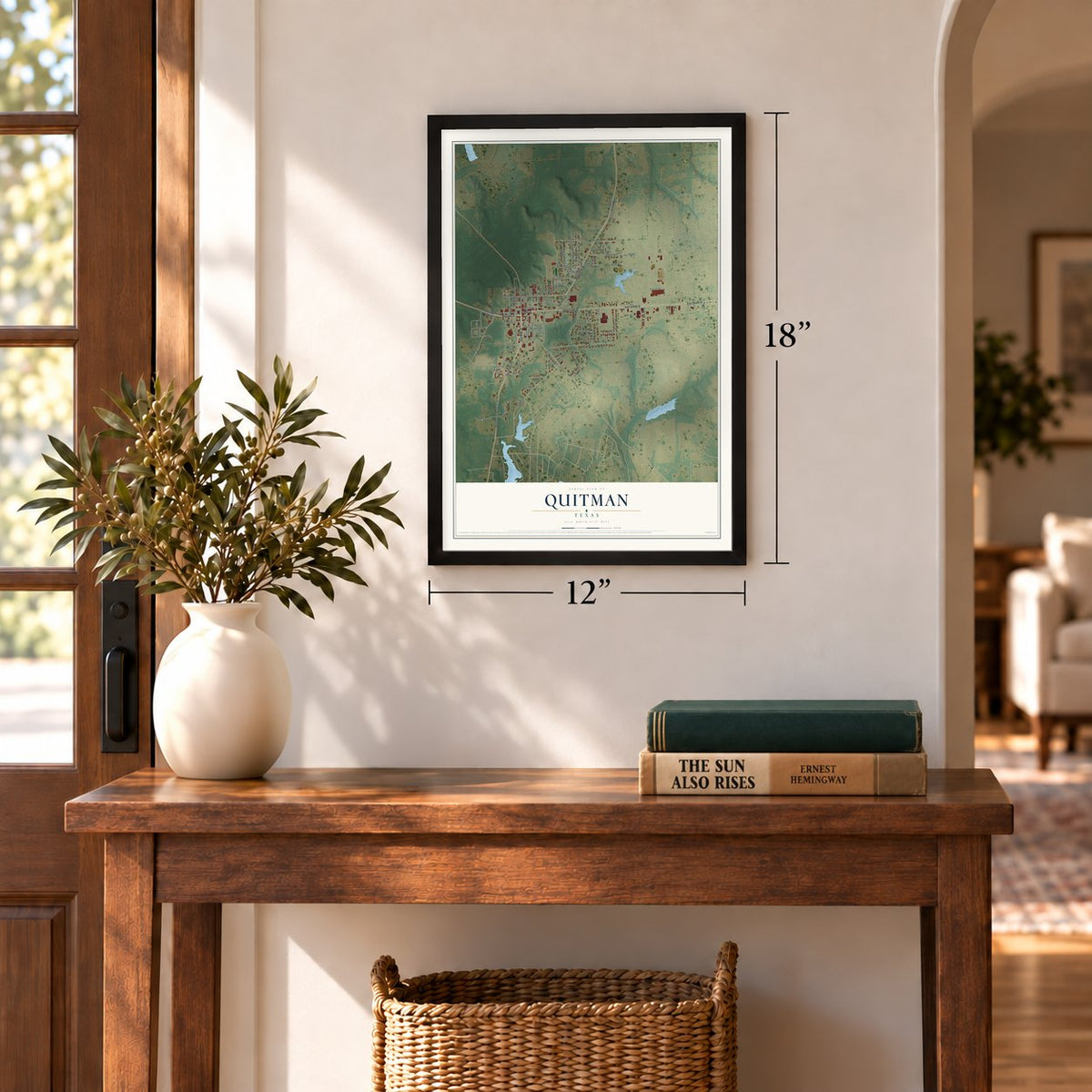 Quitman, Texas map, 12 x 18 inch print in a black frame in an entryway