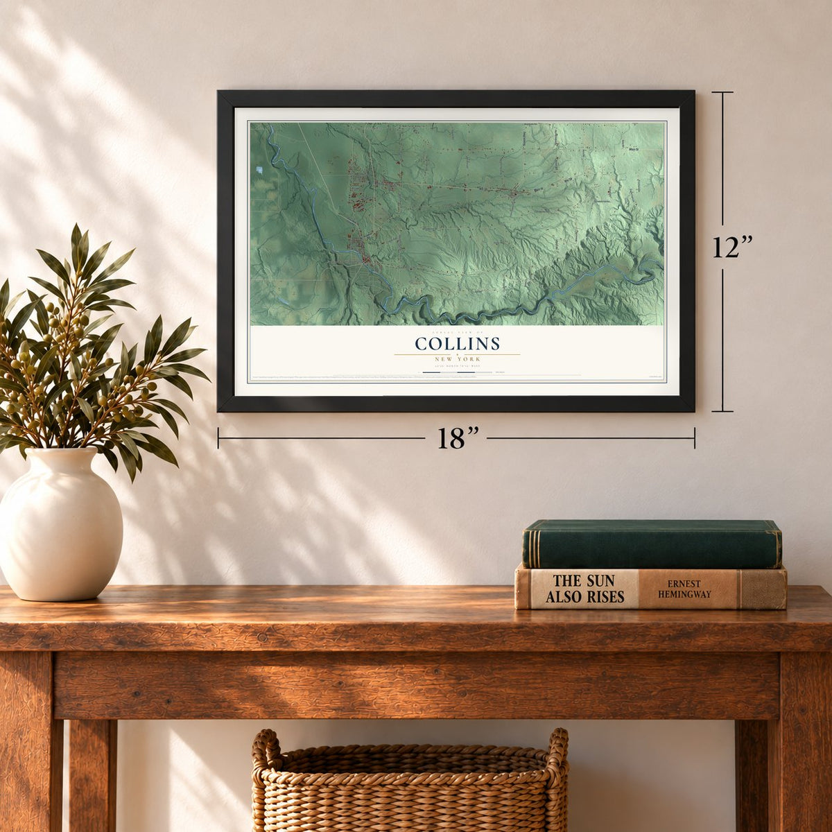 Collins, New York map, 12 x 18 inch print in a black frame in an entryway