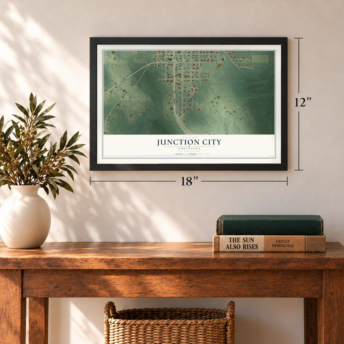 Junction City, Louisiana map, 12 x 18 inch print in a black frame in an entryway