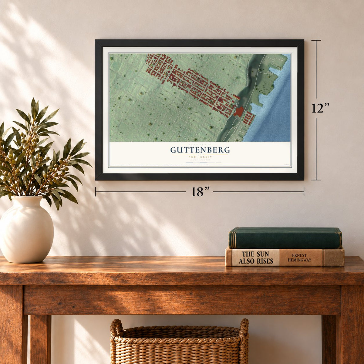 Guttenberg, New Jersey map, 12 x 18 inch print in a black frame in an entryway