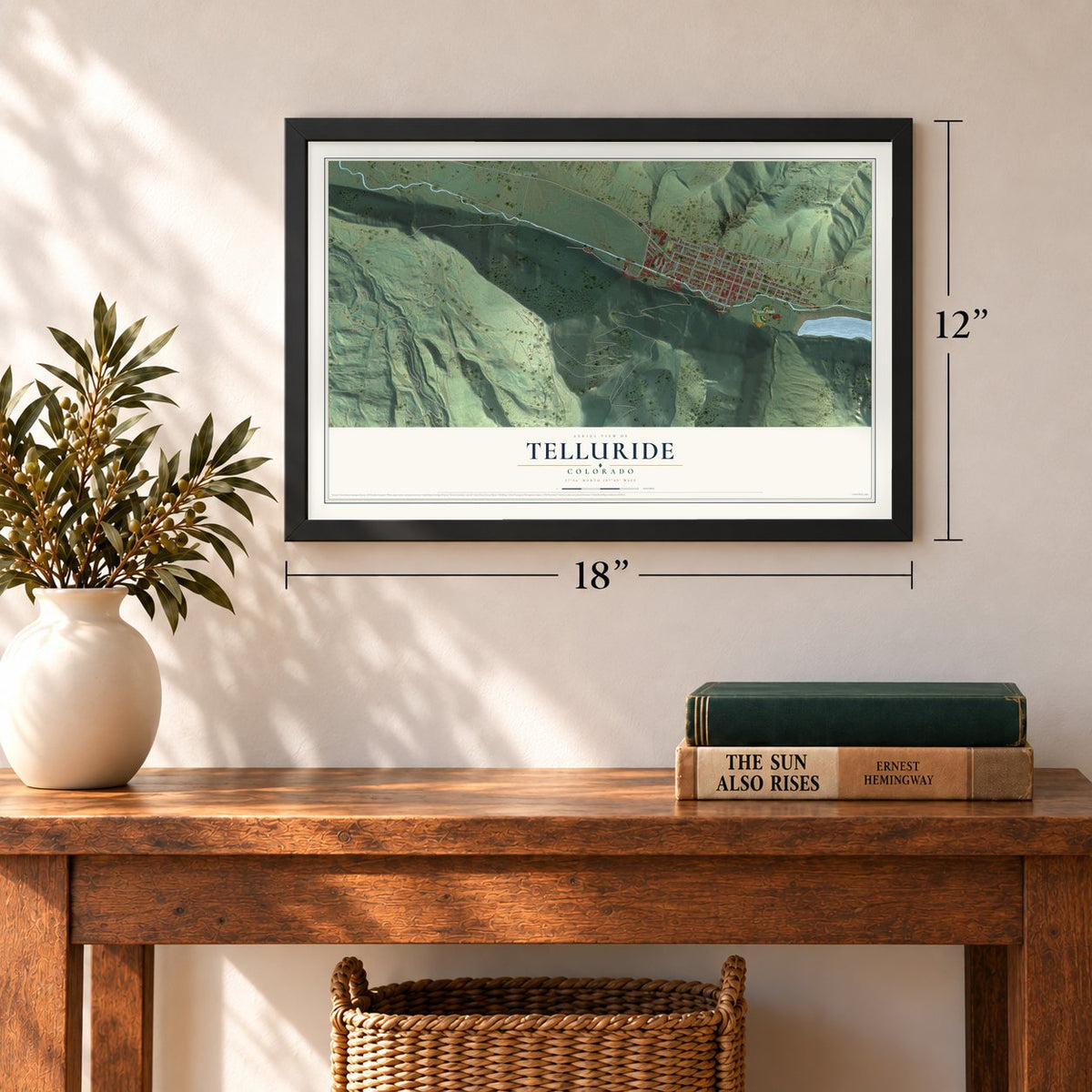 Telluride, Colorado map, 12 x 18 inch print in a black frame in an entryway