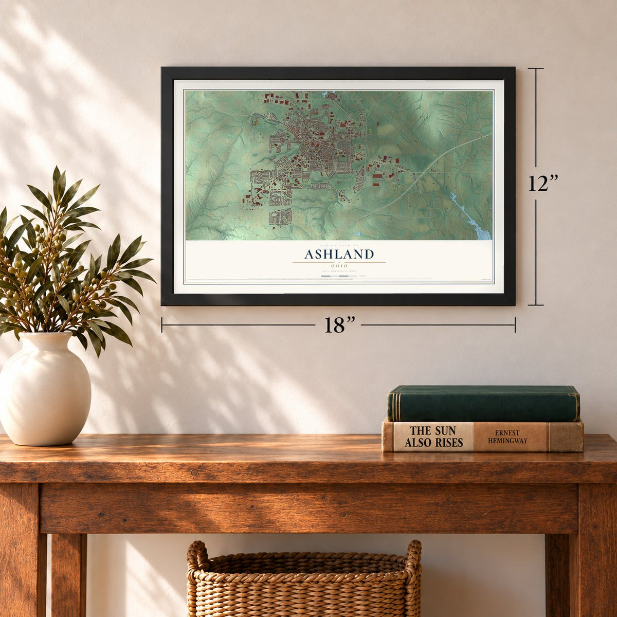 Ashland, Ohio map, 12 x 18 inch print in a black frame in an entryway