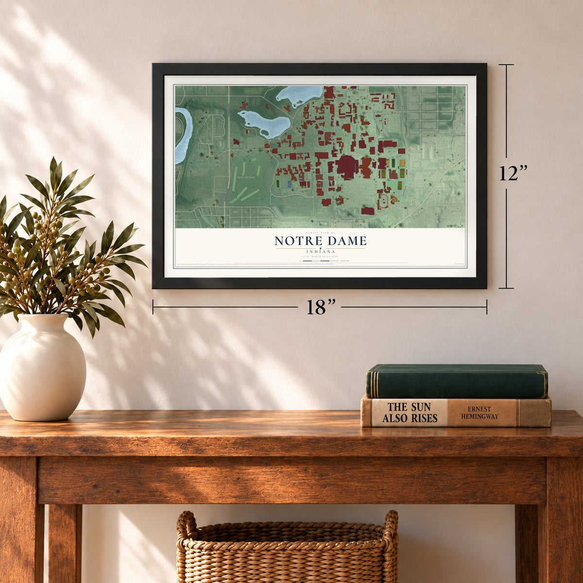 Notre Dame, Indiana map, 12 x 18 inch print in a black frame in an entryway