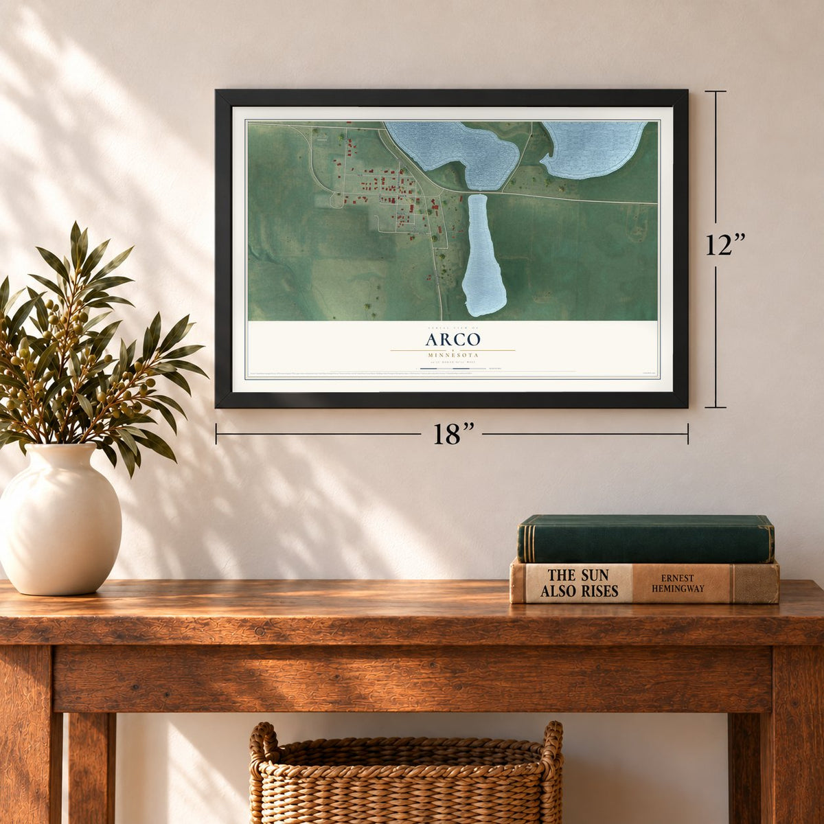 Arco, Minnesota map, 12 x 18 inch print in a black frame in an entryway