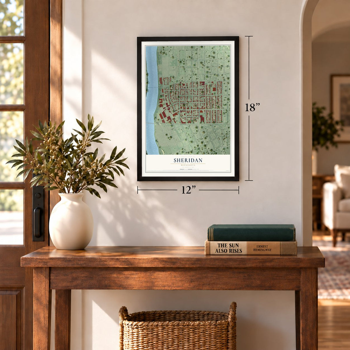 Sheridan, Minnesota map, 12 x 18 inch print in a black frame in an entryway