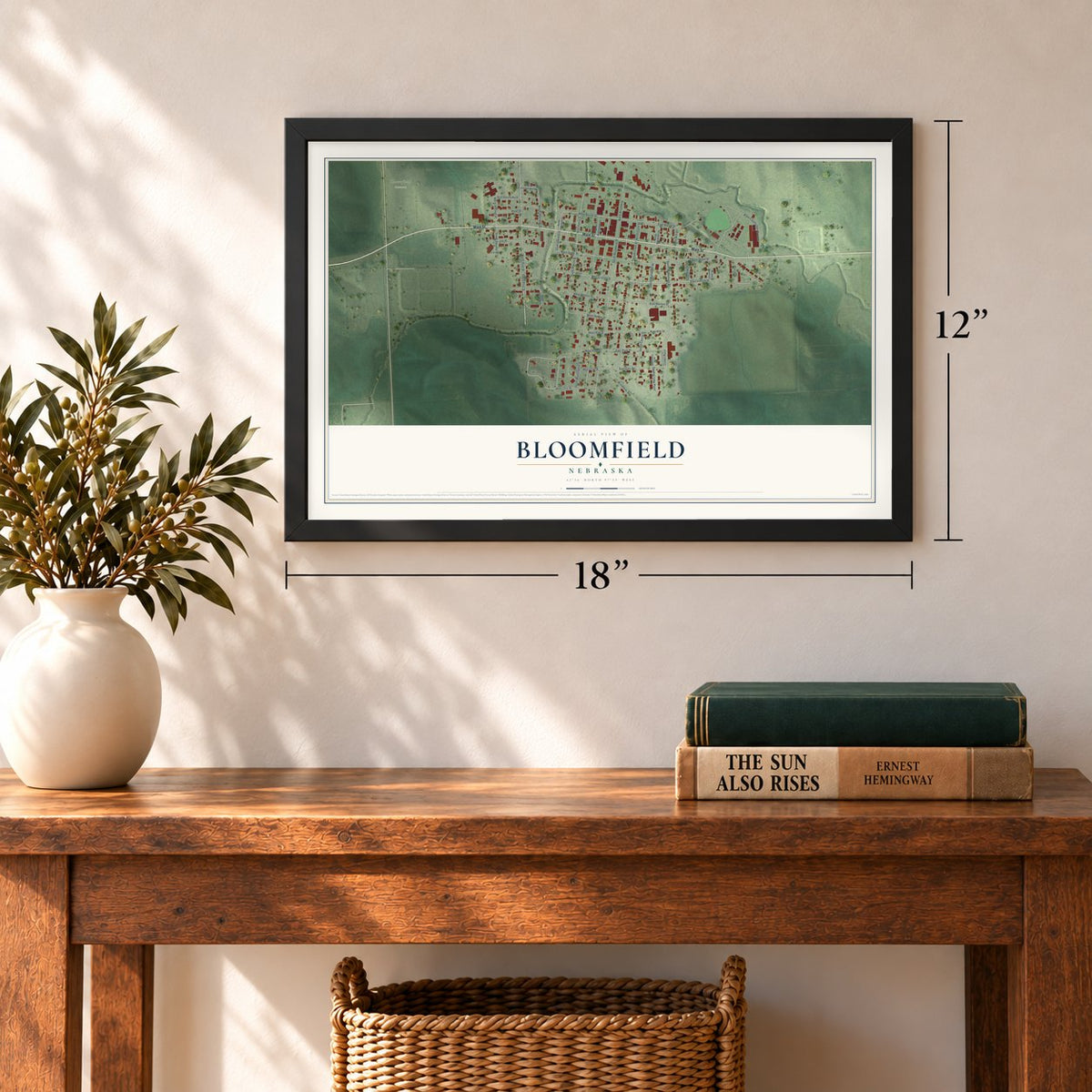 Bloomfield, Nebraska map, 12 x 18 inch print in a black frame in an entryway