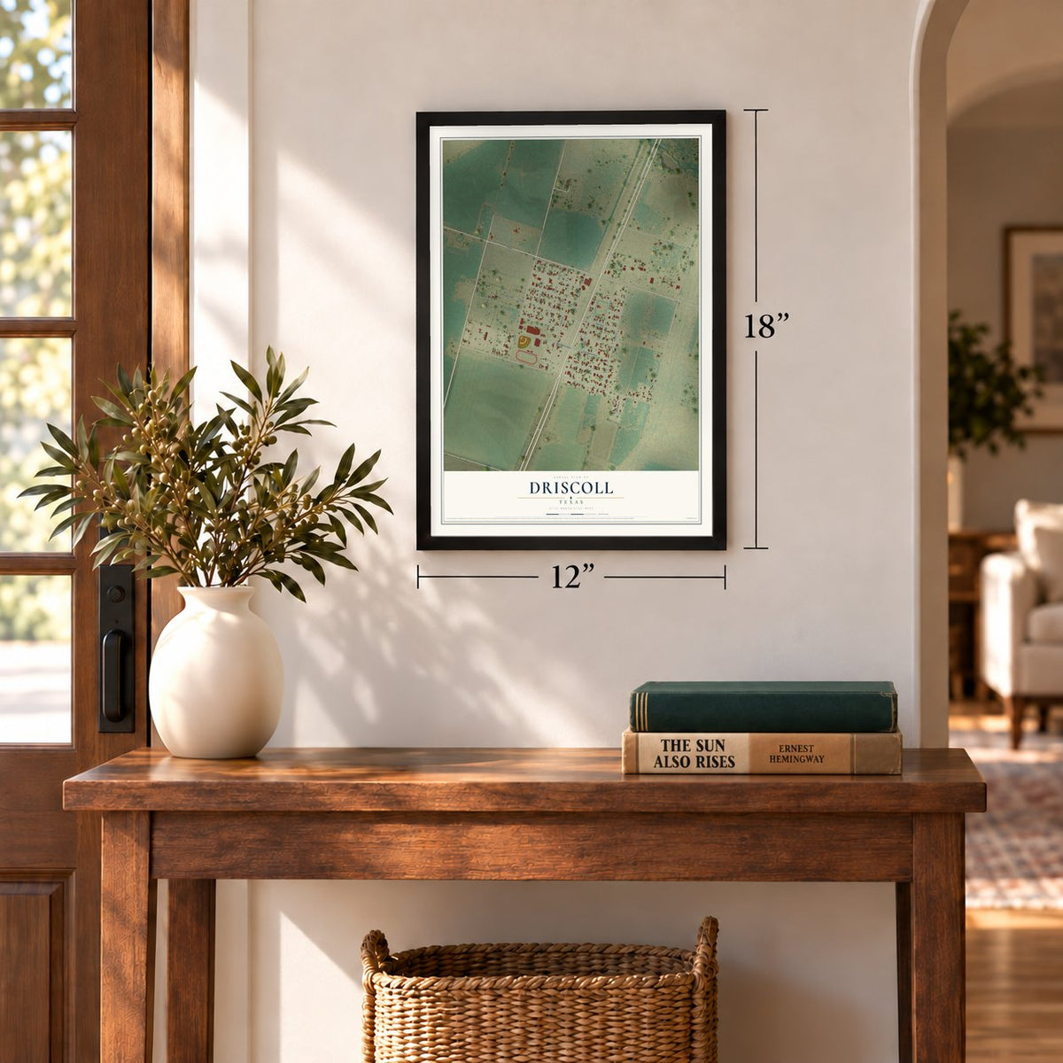 Driscoll, Texas map, 12 x 18 inch print in a black frame in an entryway