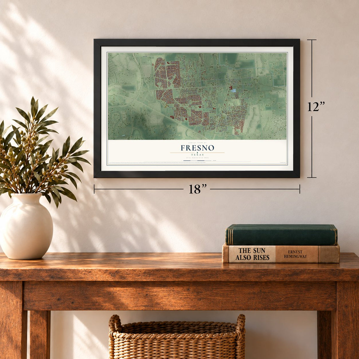 Fresno, Texas map, 12 x 18 inch print in a black frame in an entryway