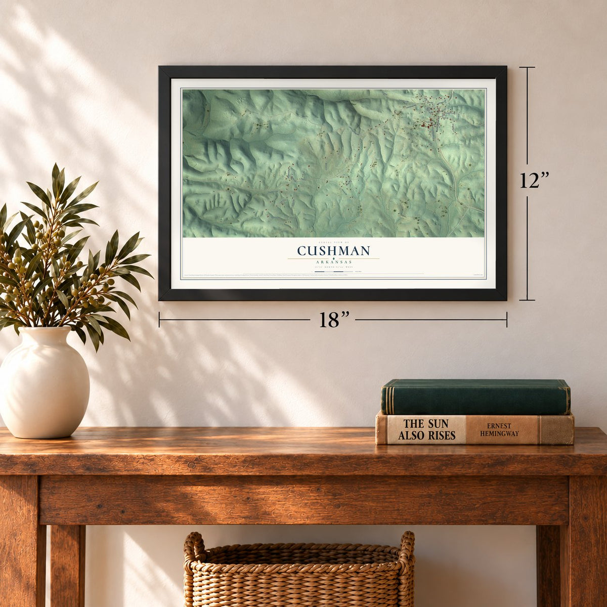 Cushman, Arkansas map, 12 x 18 inch print in a black frame in an entryway