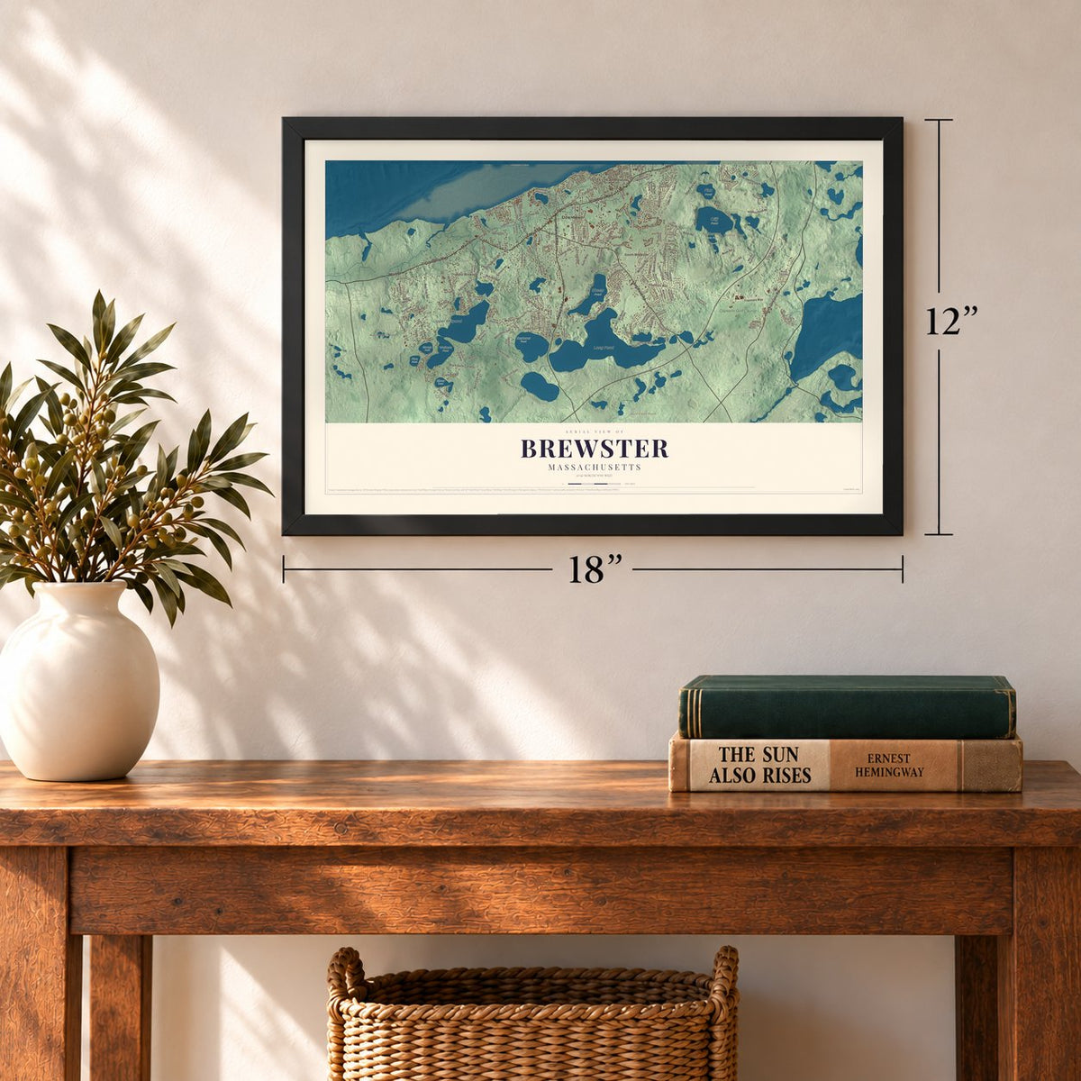 Brewster, Massachusetts map, 12 x 18 inch print in a black frame in an entryway