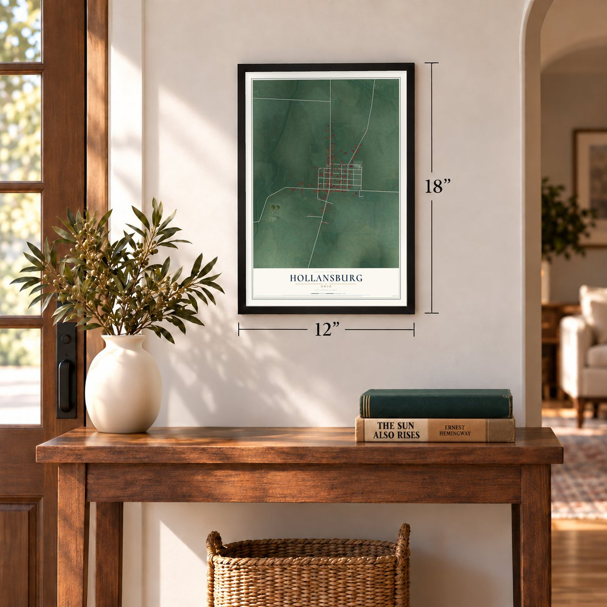 Hollansburg, Ohio map, 12 x 18 inch print in a black frame in an entryway