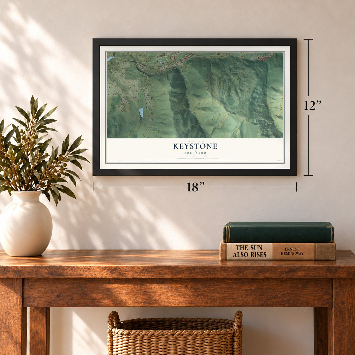 Keystone, Colorado map, 12 x 18 inch print in a black frame in an entryway