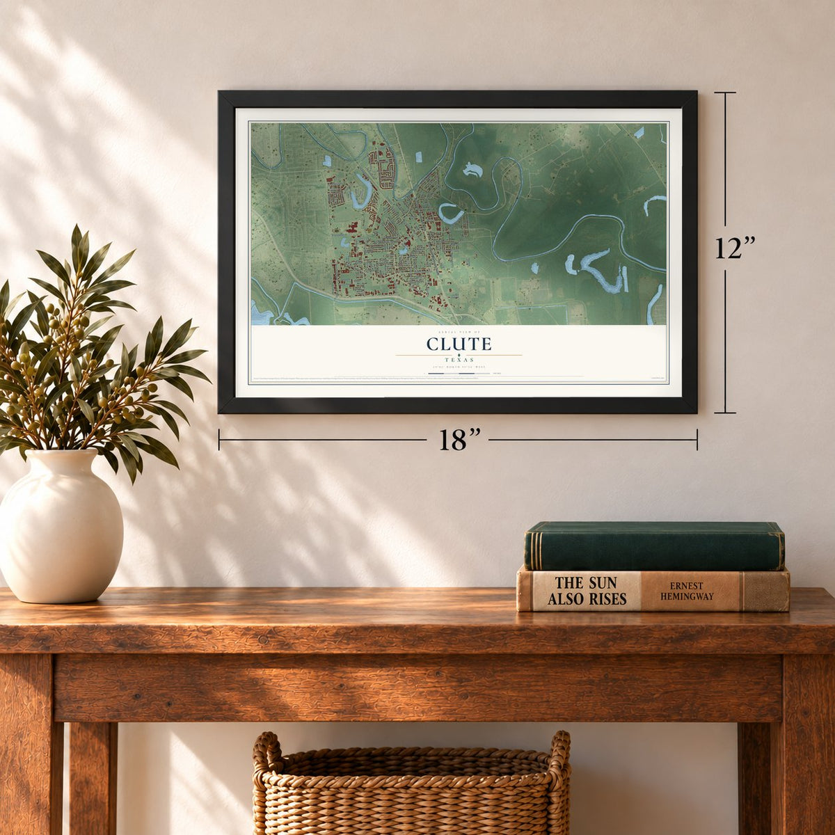 Clute, Texas map, 12 x 18 inch print in a black frame in an entryway