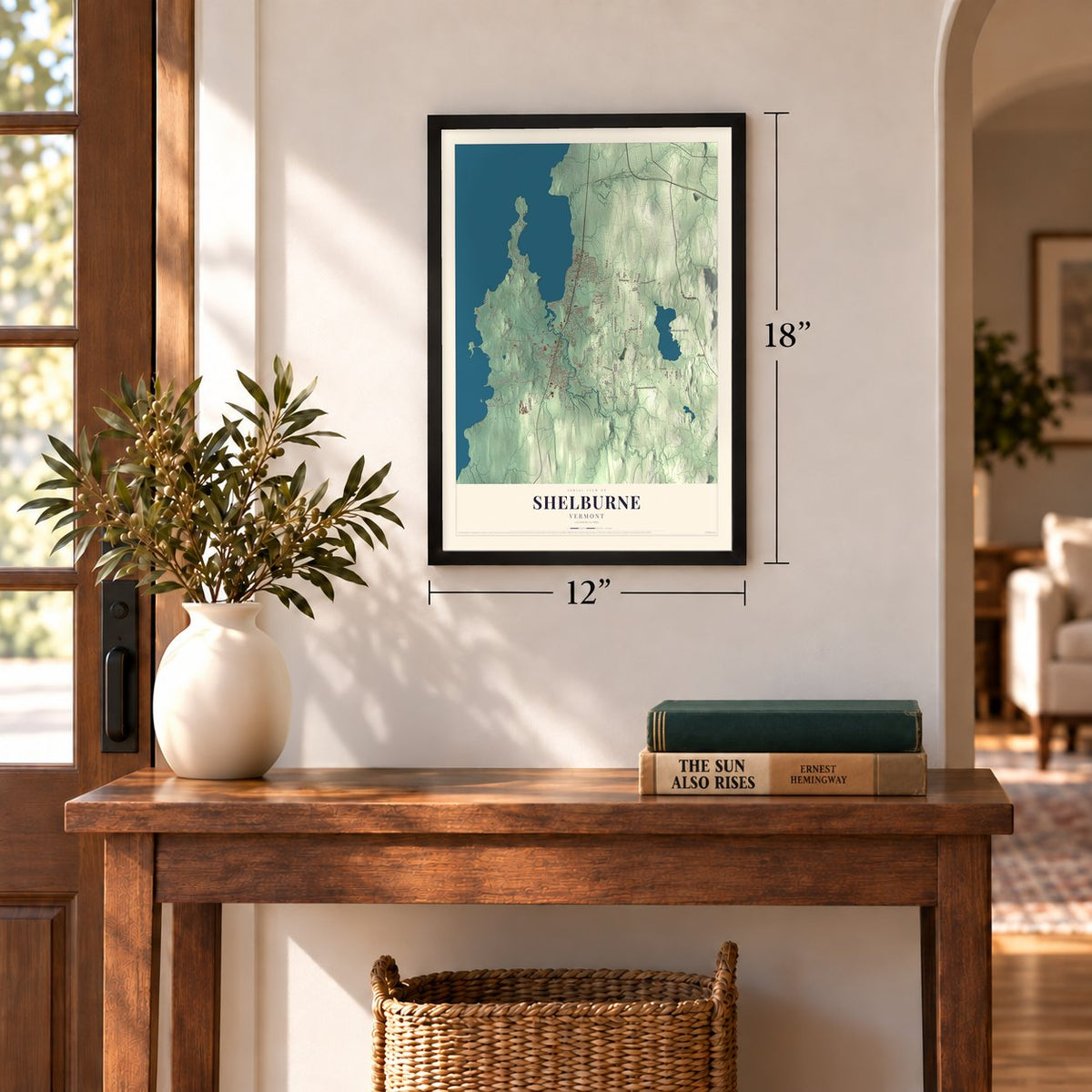 Shelburne, Vermont map, 12 x 18 inch print in a black frame in an entryway