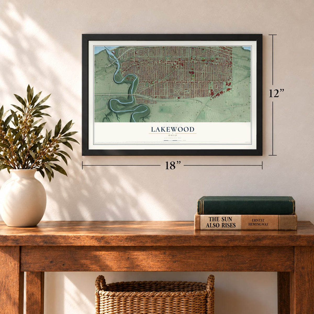 Lakewood, Ohio map, 12 x 18 inch print in a black frame in an entryway