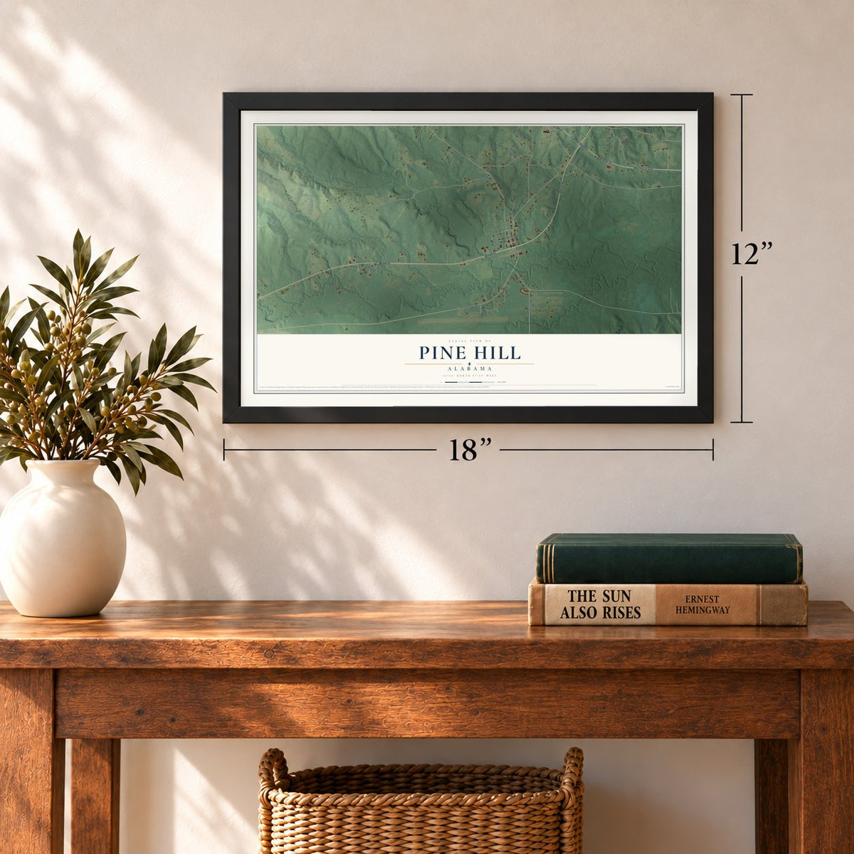 Pine Hill, Alabama map, 12 x 18 inch print in a black frame in an entryway