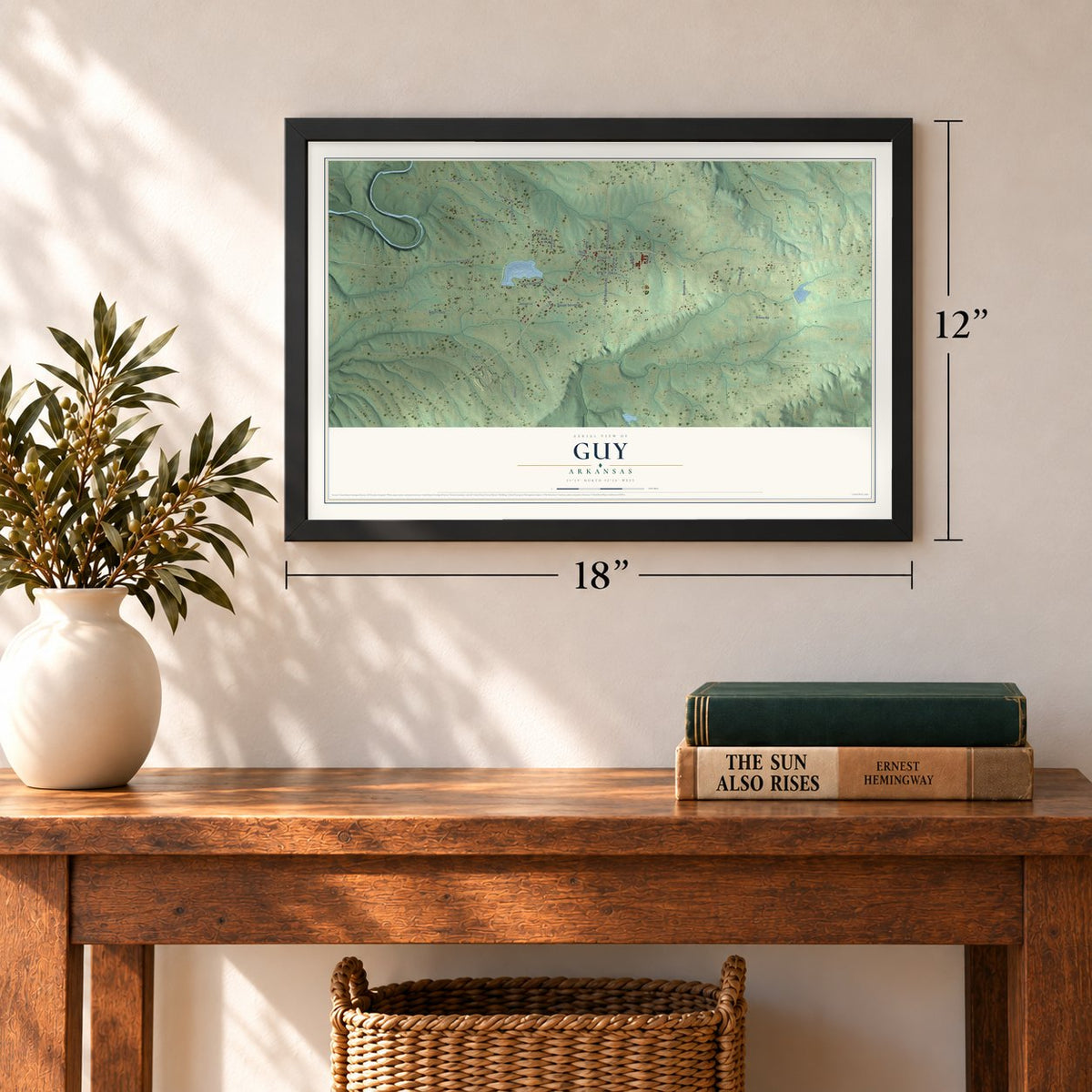 Guy, Arkansas map, 12 x 18 inch print in a black frame in an entryway
