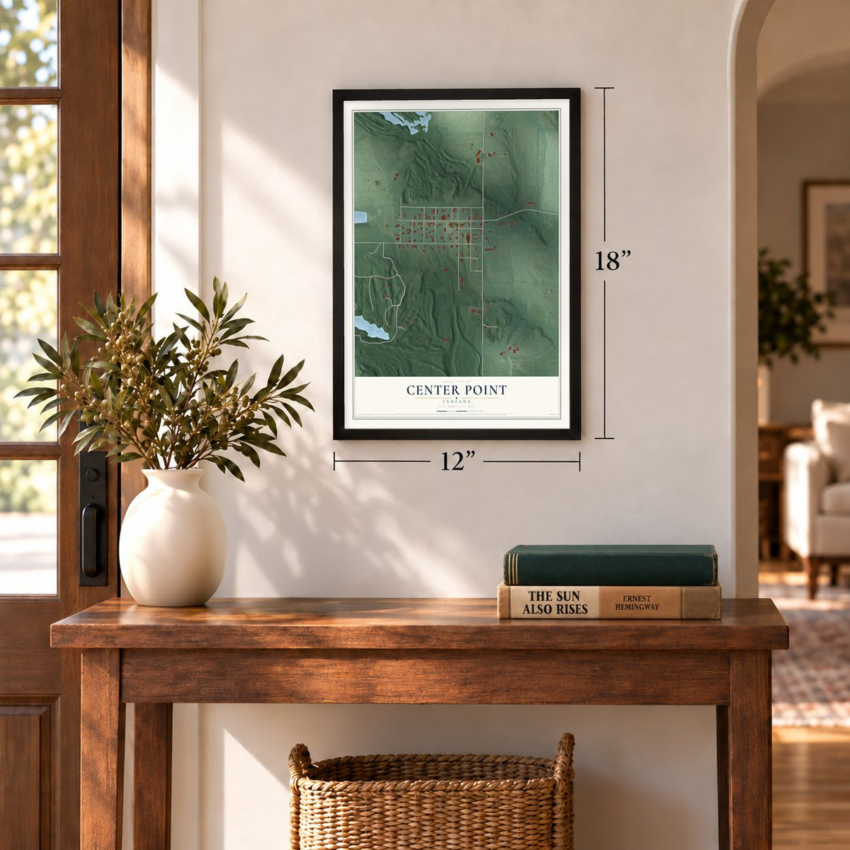 Center Point, Indiana map, 12 x 18 inch print in a black frame in an entryway