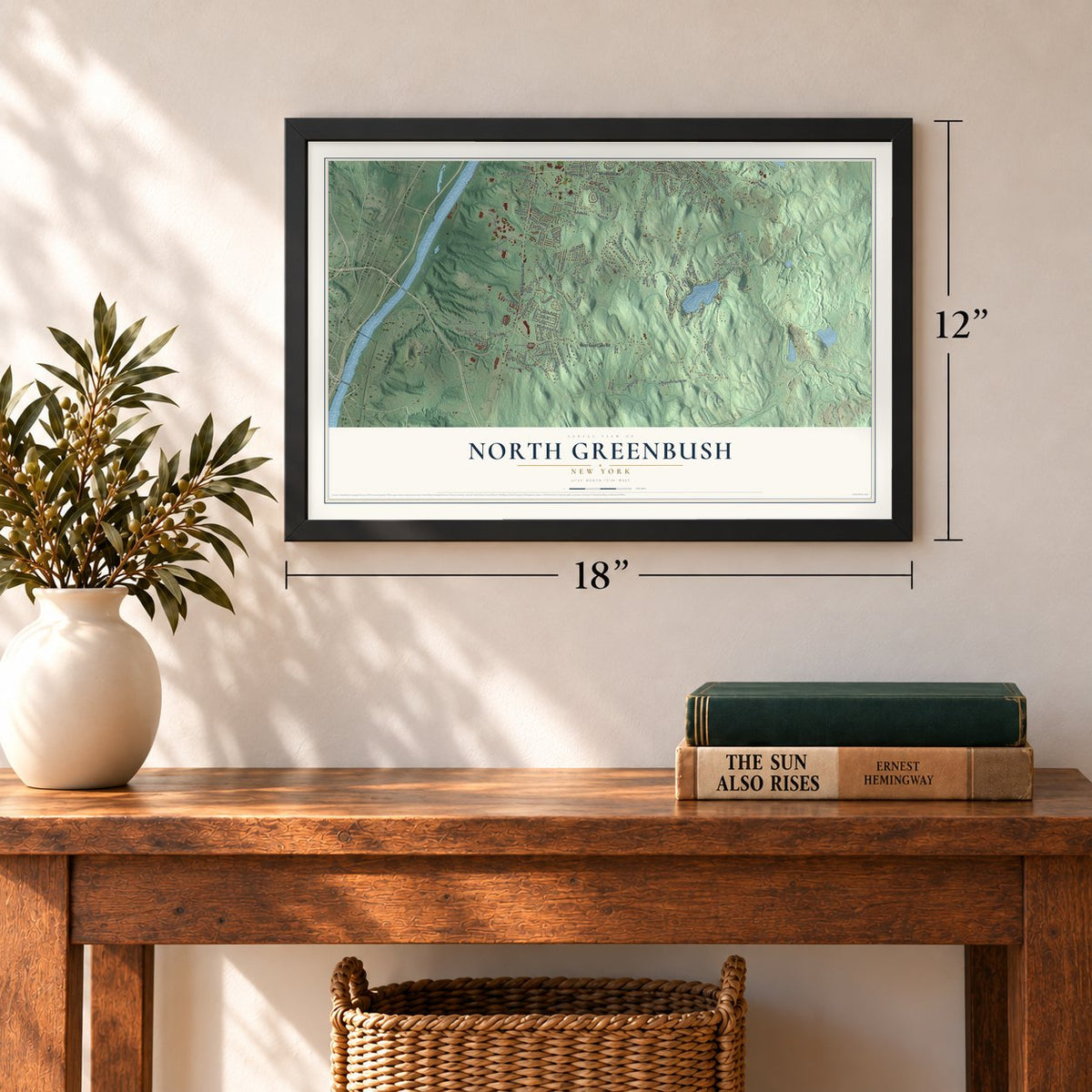 North Greenbush, New York map, 12 x 18 inch print in a black frame in an entryway