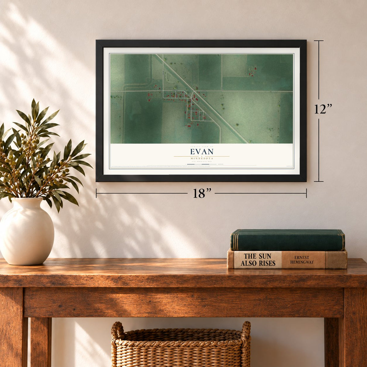 Evan, Minnesota map, 12 x 18 inch print in a black frame in an entryway