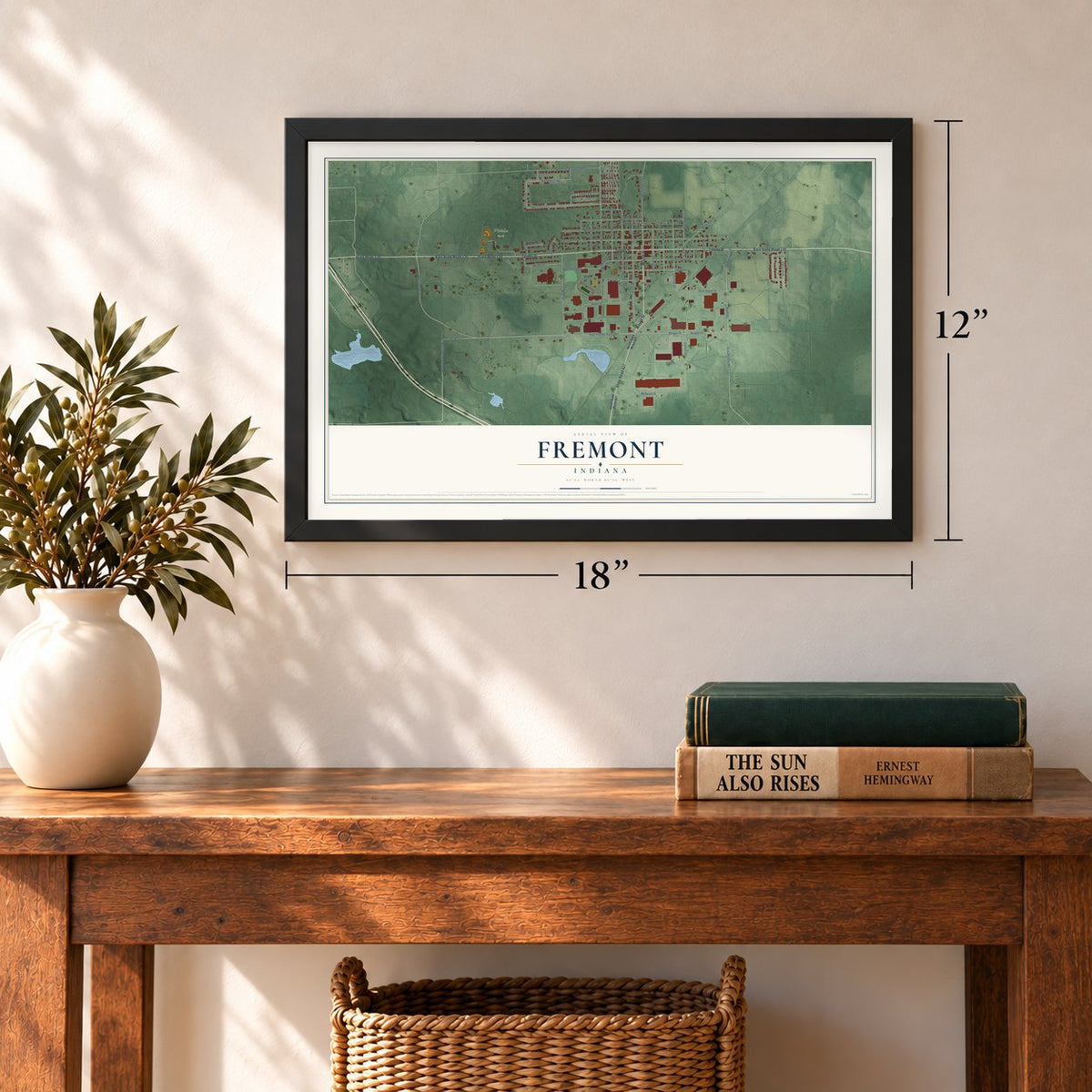 Fremont, Indiana map, 12 x 18 inch print in a black frame in an entryway