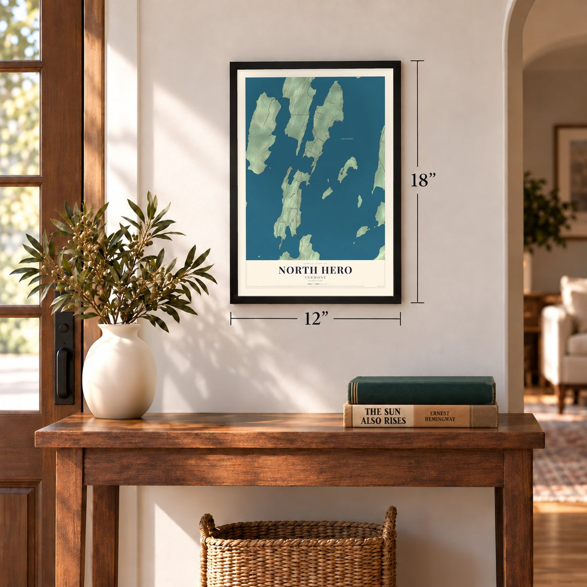 North Hero, Vermont map, 12 x 18 inch print in a black frame in an entryway