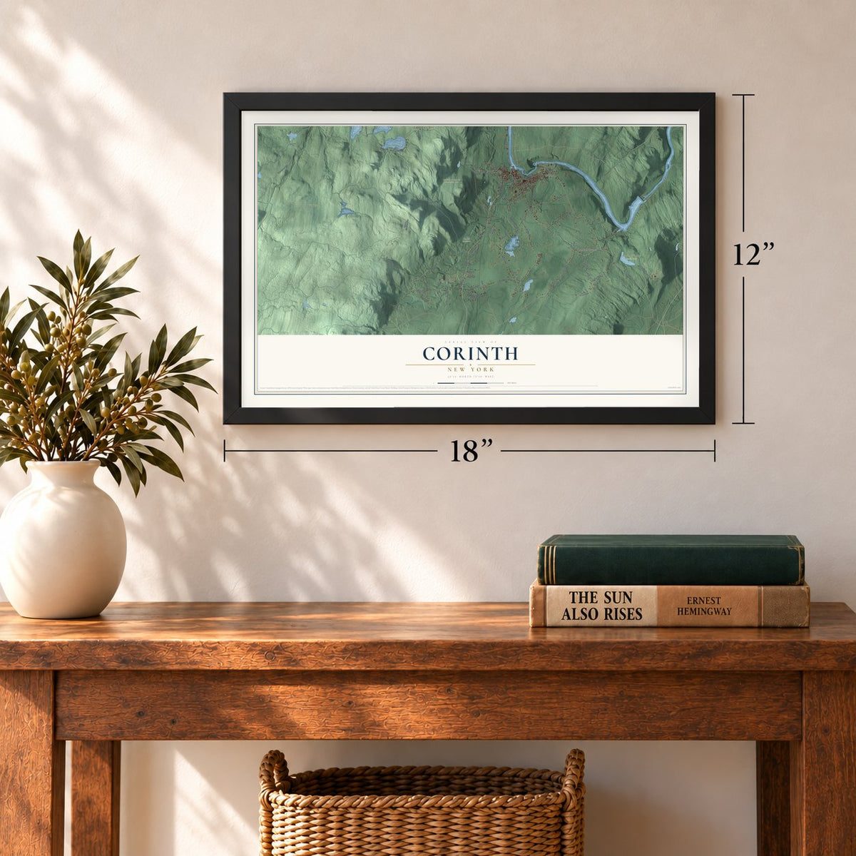 Corinth, New York map, 12 x 18 inch print in a black frame in an entryway