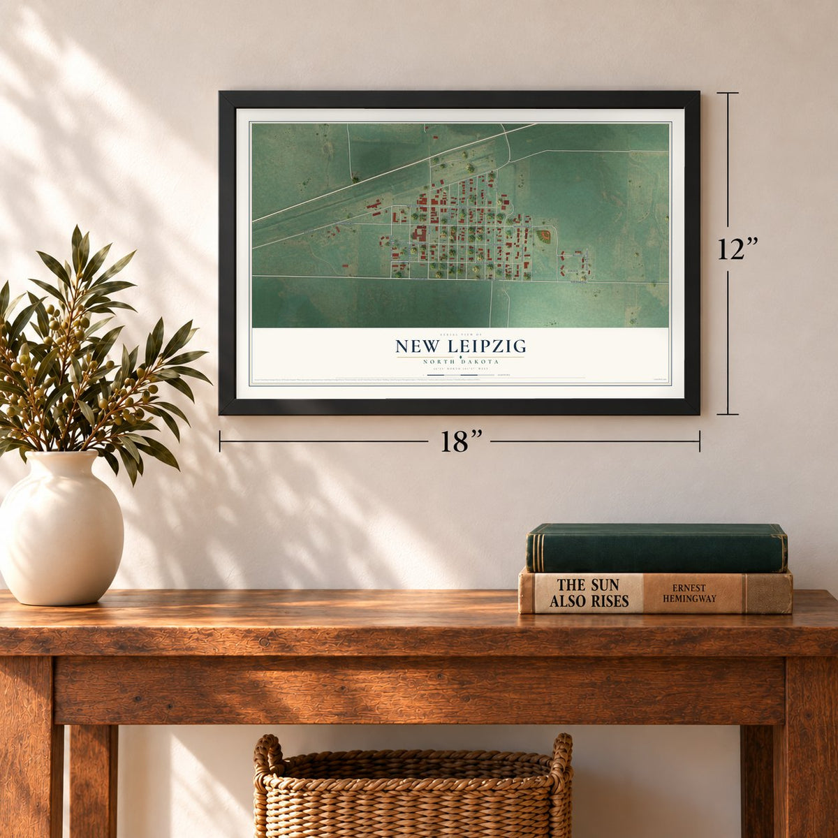 New Leipzig, North Dakota map, 12 x 18 inch print in a black frame in an entryway