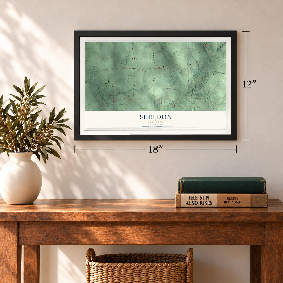 Sheldon, New York map, 12 x 18 inch print in a black frame in an entryway
