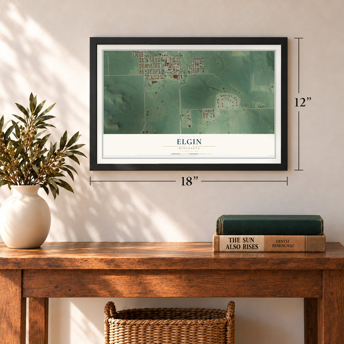 Elgin, Minnesota map, 12 x 18 inch print in a black frame in an entryway
