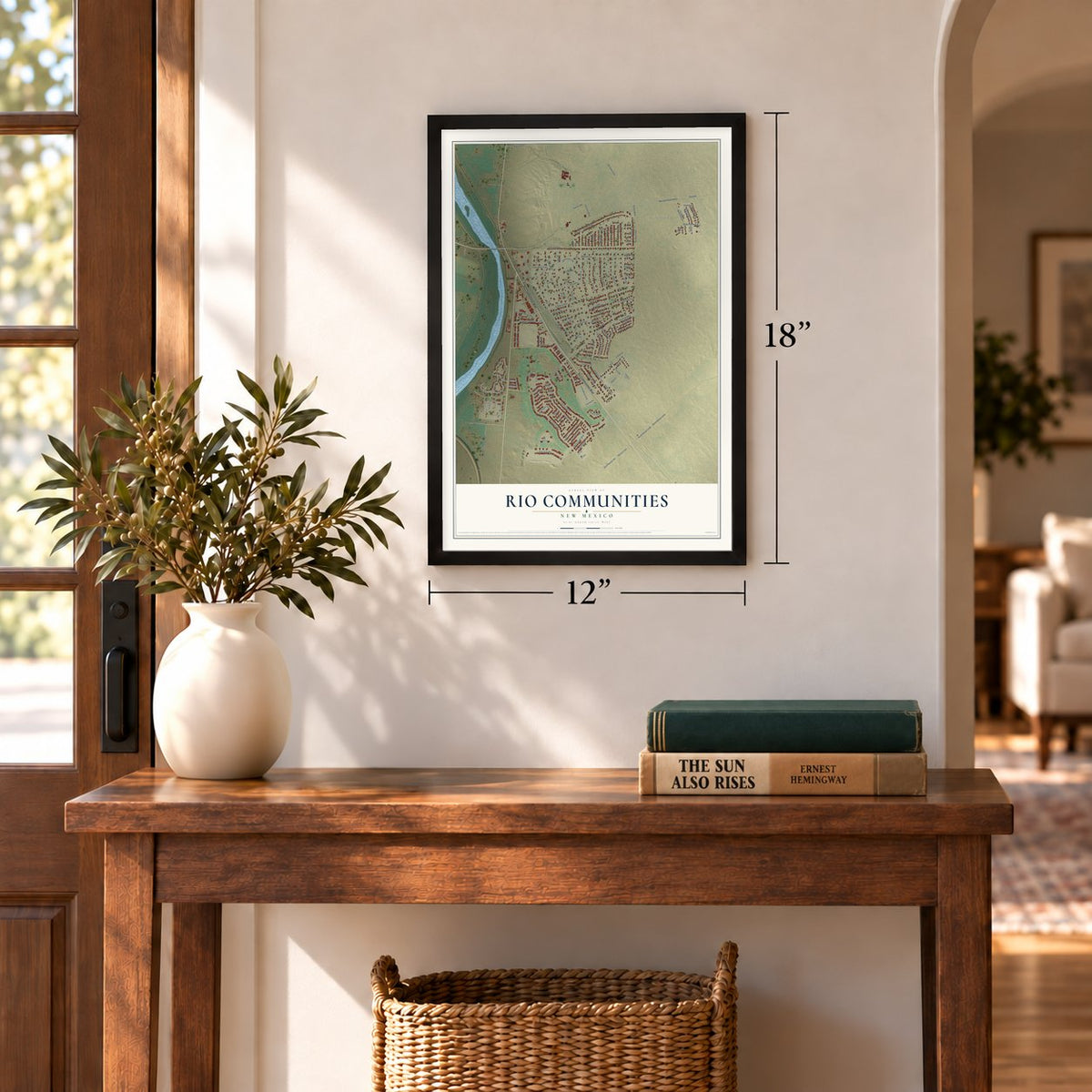 Rio Communities, New Mexico map, 12 x 18 inch print in a black frame in an entryway