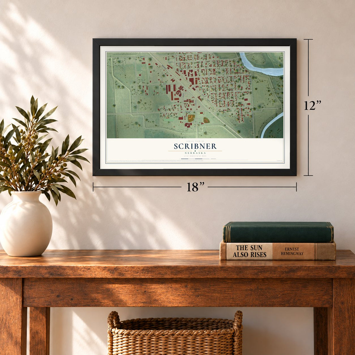 Scribner, Nebraska map, 12 x 18 inch print in a black frame in an entryway