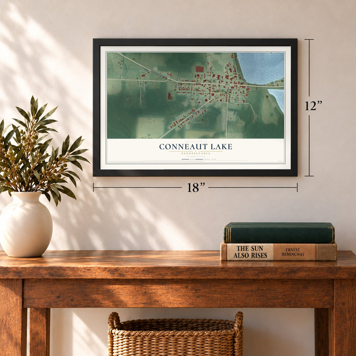 Conneaut Lake, Pennsylvania map, 12 x 18 inch print in a black frame in an entryway