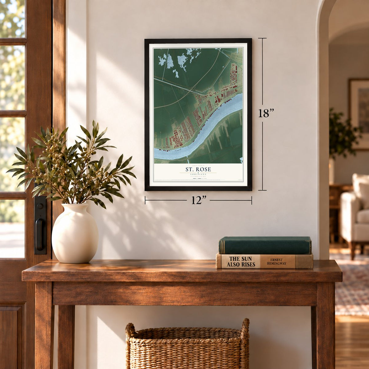 St. Rose, Louisiana map, 12 x 18 inch print in a black frame in an entryway