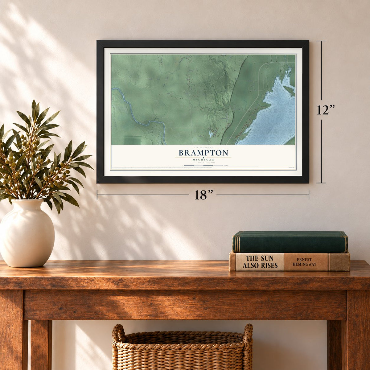 Brampton, Michigan map, 12 x 18 inch print in a black frame in an entryway