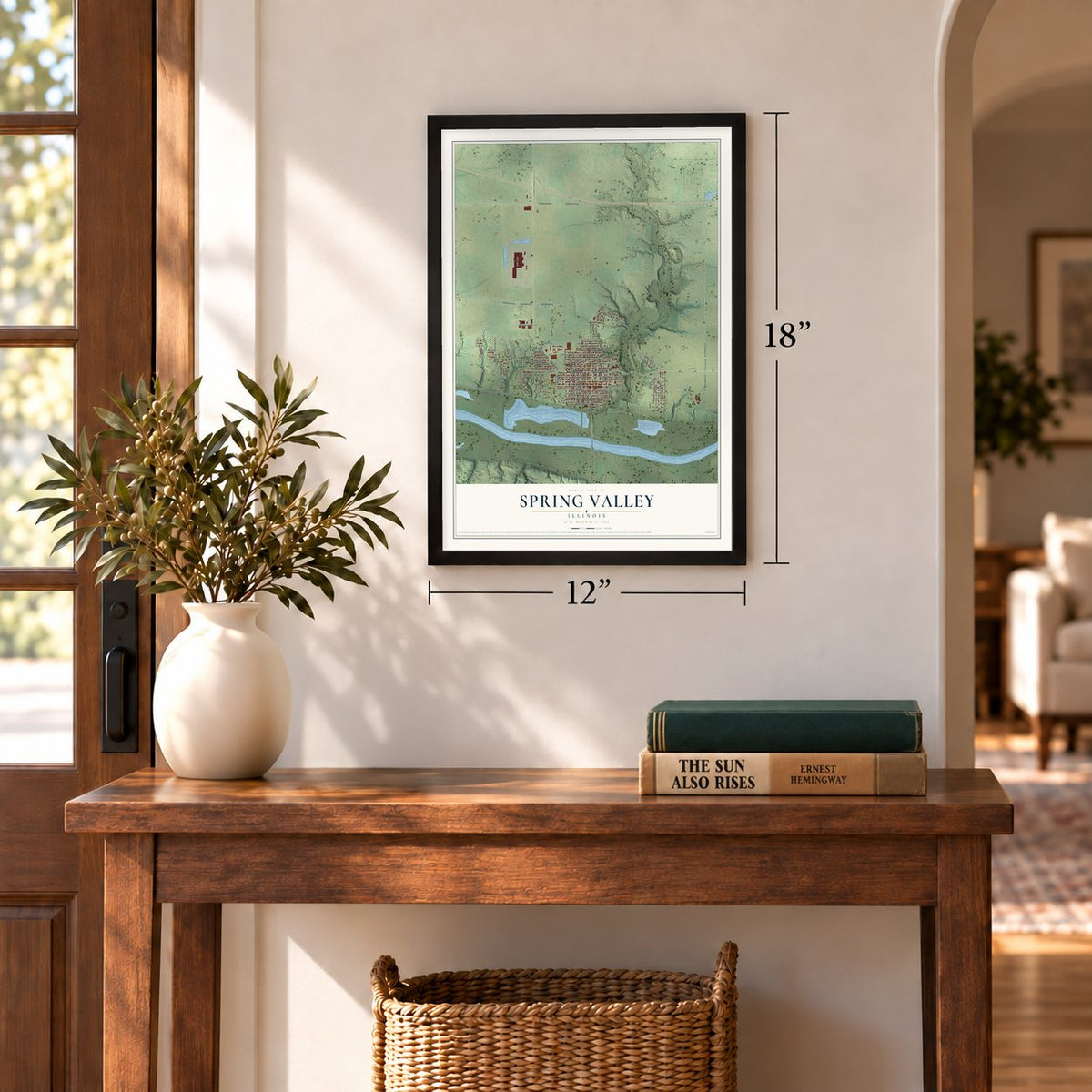 Spring Valley, Illinois map, 12 x 18 inch print in a black frame in an entryway