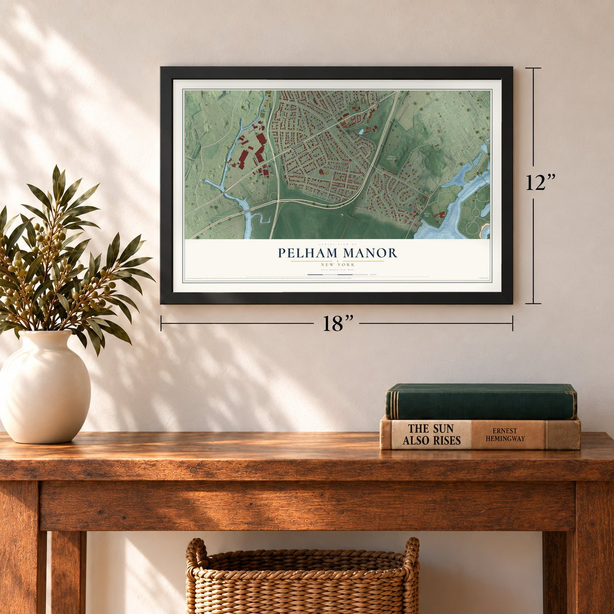 Pelham Manor, New York map, 12 x 18 inch print in a black frame in an entryway